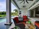 Outdoor space with a luxurious pool, patio furniture, and manicured landscaping at 9979 Winnington St, Orlando, FL 32832