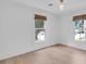 Serene bedroom with natural light and hardwood floors at 1021 S Elm Ave, Sanford, FL 32771