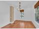 Dining room featuring hardwood floors, brick column and window at 1021 S Elm Ave, Sanford, FL 32771