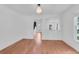 Living room featuring hardwood floors and staircase at 1021 S Elm Ave, Sanford, FL 32771