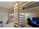 Bright bedroom showcases a triple loft bed and a fun, organized play space at 1103 Lake Legro Ct, Orlando, FL 32835