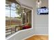 Cozy breakfast nook with hardwood floors, views of the patio, and a modern pendant light at 1103 Lake Legro Ct, Orlando, FL 32835