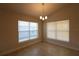 Cozy dining area featuring two large windows offering lots of natural light at 1105 Citrus Landings Blvd, Davenport, FL 33837