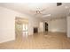 Bright, open-concept living area featuring tile floors, fireplace, and multiple skylights at 139 Stoney Ridge Dr, Longwood, FL 32750