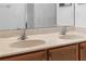 Modern bathroom featuring double sinks, vanity with detailed cabinets at 1457 Teal Dr, Kissimmee, FL 34759