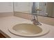 Bright bathroom with single sink and modern faucet fixture at 1457 Teal Dr, Kissimmee, FL 34759