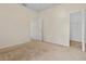 Neutral bedroom shows a view of closet and door to the next room at 1457 Teal Dr, Kissimmee, FL 34759