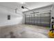 Spacious two car garage with automatic door opener and concrete floors at 1457 Teal Dr, Kissimmee, FL 34759
