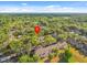 Expansive aerial view of wooded community, showcasing lush greenery and serene surroundings at 1547 Farrindon Cir # 1547, Lake Mary, FL 32746