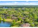Enjoy views of lakefront living in this quiet community surrounded by mature trees and lush landscaping at 1547 Farrindon Cir # 1547, Lake Mary, FL 32746