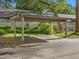 Exterior shot of designated parking with shade trees nearby the property's entrance at 1547 Farrindon Cir # 1547, Lake Mary, FL 32746