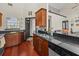 Contemporary kitchen with wood floors, granite countertops, and modern cabinetry at 1547 Farrindon Cir # 1547, Lake Mary, FL 32746