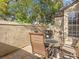 Cozy patio with an outdoor grill and comfortable seating, perfect for outdoor relaxation at 1547 Farrindon Cir # 1547, Lake Mary, FL 32746