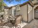 Outdoor patio area featuring a stone table with comfortable seating and a built-in grill at 1547 Farrindon Cir # 1547, Lake Mary, FL 32746