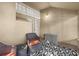 Cozy screened porch with patio furniture, offering a peaceful outdoor retreat at 1547 Farrindon Cir # 1547, Lake Mary, FL 32746