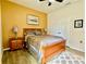 Cozy main bedroom with ample natural light, closet and a ceiling fan at 1573 Amber Leaf Cir, Ocoee, FL 34761