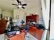 Home office featuring built-in desk, natural light, comfortable seating, and practical layout at 1573 Amber Leaf Cir, Ocoee, FL 34761