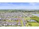 Aerial view of neighborhood with a community pool and surrounding lakes at 19105 Planetree St, Orlando, FL 32827