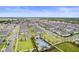 Community view showing neighborhood pool and surrounding houses at 19105 Planetree St, Orlando, FL 32827