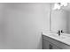 Contemporary bathroom featuring a modern vanity and ample lighting at 19105 Planetree St, Orlando, FL 32827