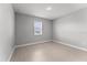 Cozy bedroom with a window offering natural light and neutral wall color at 19105 Planetree St, Orlando, FL 32827