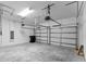 Spacious two car garage with ample room for vehicles and storage at 19105 Planetree St, Orlando, FL 32827