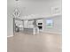 Open concept kitchen with island and stainless steel appliances and modern lights at 19105 Planetree St, Orlando, FL 32827