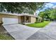 Charming home with a well-manicured lawn and welcoming front porch at 2009 E Grant St, Orlando, FL 32806