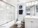 Clean bathroom with a glass-enclosed shower and tub combination, plus sleek fixtures at 2055 S Atlantic Ave # 505, Daytona Beach, FL 32118