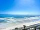 Sweeping ocean view featuring a pristine sandy beach and crashing waves at 2055 S Atlantic Ave # 505, Daytona Beach, FL 32118
