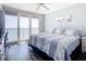 Bedroom featuring ocean views, a comfortable bed, and ample natural light at 2055 S Atlantic Ave # 505, Daytona Beach, FL 32118