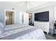 Serene main bedroom with a large TV and ensuite bathroom, offering a relaxing retreat at 2055 S Atlantic Ave # 505, Daytona Beach, FL 32118