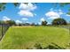Open baseball field with manicured green grass, and a clear blue sky at 20610 Maxim Pkwy, Orlando, FL 32833
