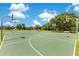 Outdoor basketball court with multiple hoops, ideal for sports and recreation at 20610 Maxim Pkwy, Orlando, FL 32833