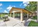 Covered picnic area with tables and a grill, great for outdoor gatherings and BBQs at 20610 Maxim Pkwy, Orlando, FL 32833