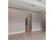Spacious open-concept living room with neutral paint, tile flooring, and natural light at 2066 Cresswell St, Ocoee, FL 34761