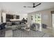 Open-concept living room with view of kitchen and sliding glass doors at 2066 Cresswell St, Ocoee, FL 34761