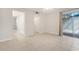 Bedroom with two closets, tile floor, and sliding glass door at 208 Sonora Drive # 208, Casselberry, FL 32707