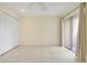 Bright bedroom with sliding glass doors and tile flooring at 208 Sonora Drive # 208, Casselberry, FL 32707