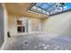 Enclosed lanai with skylights and brick flooring viewed from outdoor space at 208 Sonora Drive # 208, Casselberry, FL 32707