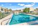 Inviting community pool surrounded by lush landscaping and comfortable seating areas at 208 Sonora Drive # 208, Casselberry, FL 32707