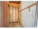 Compact storage area featuring open shelving, concrete floors, and secure wooden framing at 208 Sonora Drive # 208, Casselberry, FL 32707