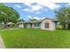 A charming single-Gathering home boasting a well-manicured lawn and a classic, inviting facade at 2309 Cilantro Dr, Orlando, FL 32837
