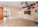 Open-concept living room with light wood flooring leads to entry and other rooms at 2309 Cilantro Dr, Orlando, FL 32837