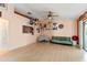 Open-concept living room with light wood flooring and eclectic decor at 2309 Cilantro Dr, Orlando, FL 32837