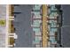 An aerial view shows private pools enclosed on homes, separated by a walking path and grassy area at 2460 Reading Trl, Kissimmee, FL 34746
