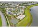 Aerial view showcasing the community pool, volleyball court, and basketball court at 2460 Reading Trl, Kissimmee, FL 34746