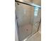 Modern bathroom features a glass shower with sleek fixtures and neutral tile at 2579 Sw 146Th St, Ocala, FL 34473