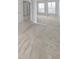 Carpeted bedroom features mirrored sliding closet doors, neutral paint, and lots of natural light at 2816 Club Cortile Cir # A, Kissimmee, FL 34746