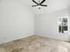 A bright bedroom with large windows, high ceilings, and beautiful marble floors at 2890 Wild Ginger Ct, Winter Park, FL 32792